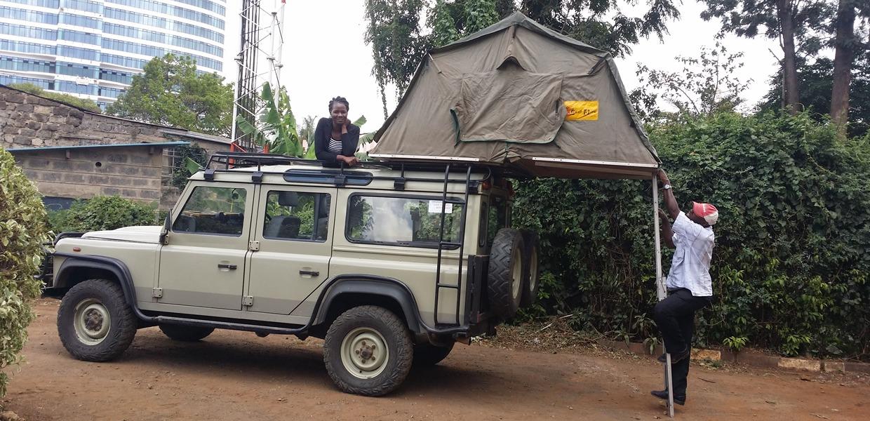 Land Rover Defender Explore Rwanda Car rental: Rooftop Tent Car Rental Freedom Key Features of a Safari-Ready SUV for Rwanda